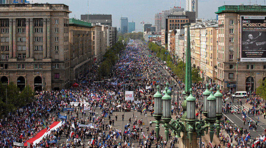 Click to enlarge People hold a giant Polish flag at an anti-government demonstration called March of Freedom Warsaw Poland May 6 2017