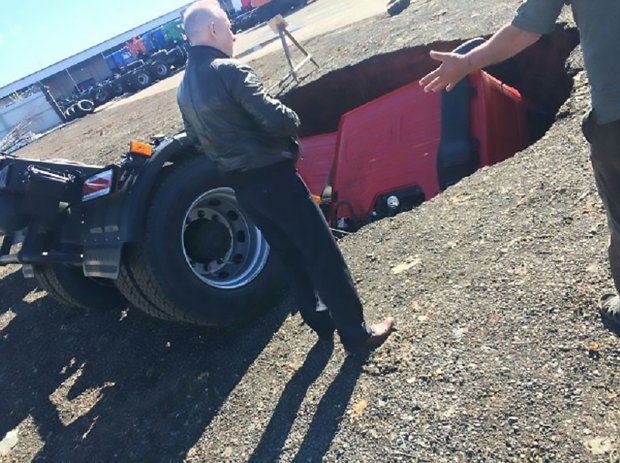 Click to enlarge The owners are believed to winched the lorries out of the hole
