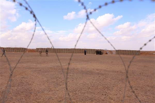 Click to enlarge Syrian women and children
