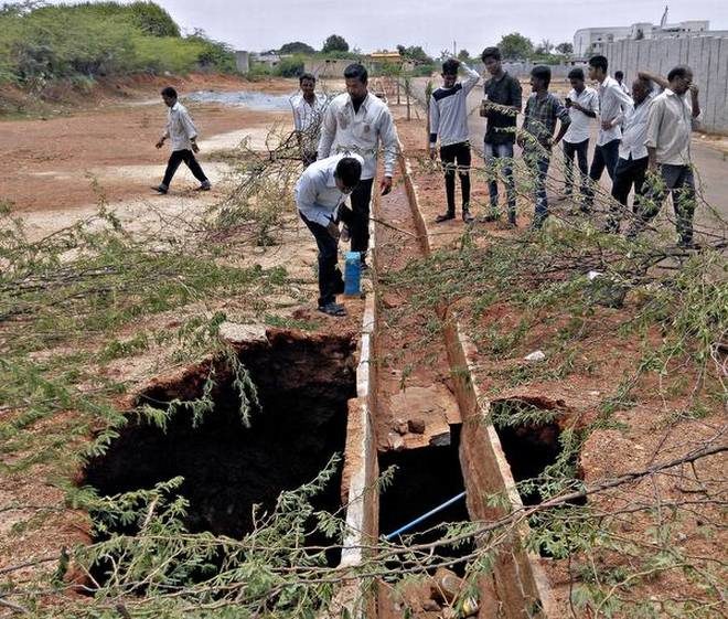 The sinkhole appeared in a private layout following two days of heavy rain in Oorgaumpet in KGF. 