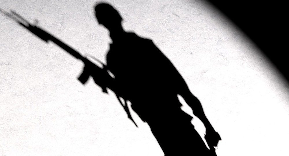 Click to enlarge silhouette of man with gun