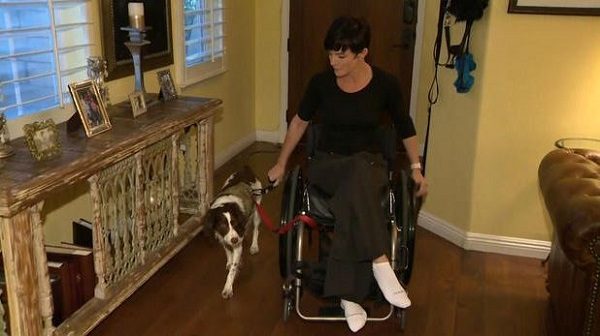 Micaela Bensko with her service dog.