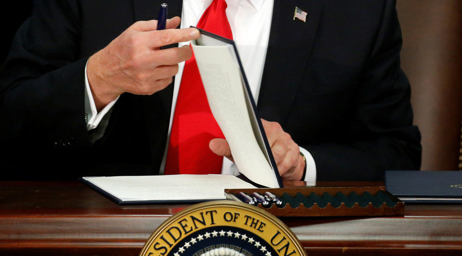 Trump signing documents