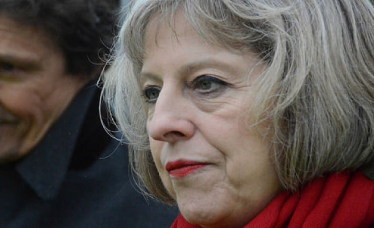 Click to enlarge Theresa May
