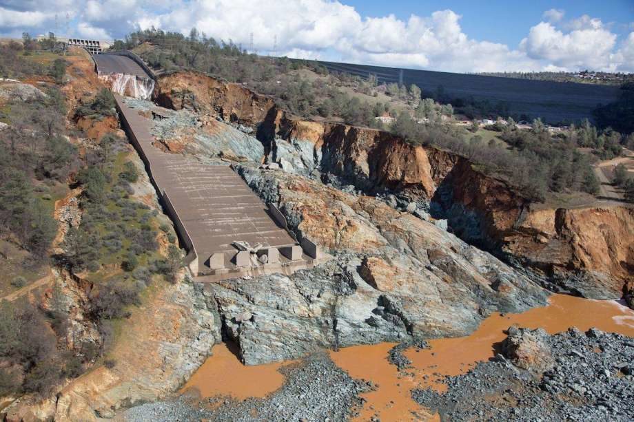 The Oroville Dam’s concrete spillway needs major repairs after an enormous section of the channel was ruined in recent rains.