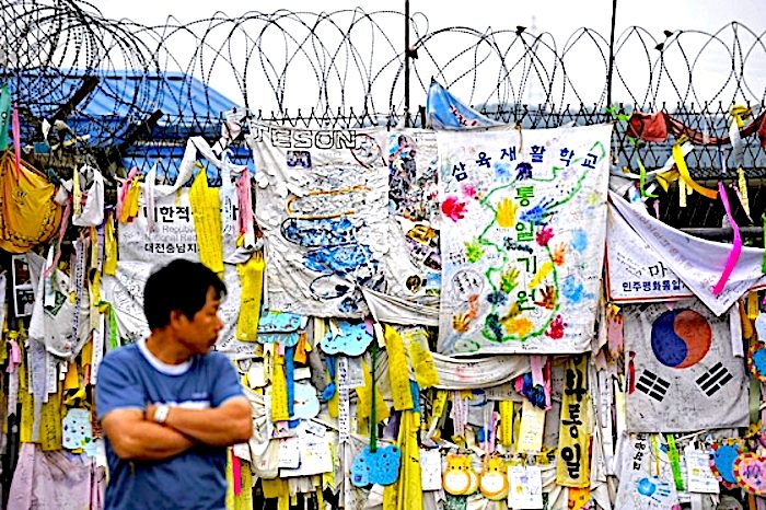Click to enlarge reunification banners fence