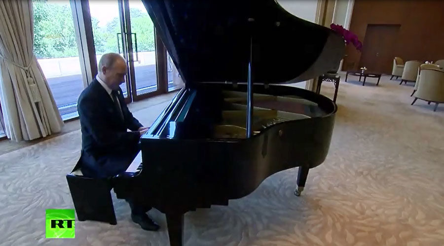 Putin playing piano