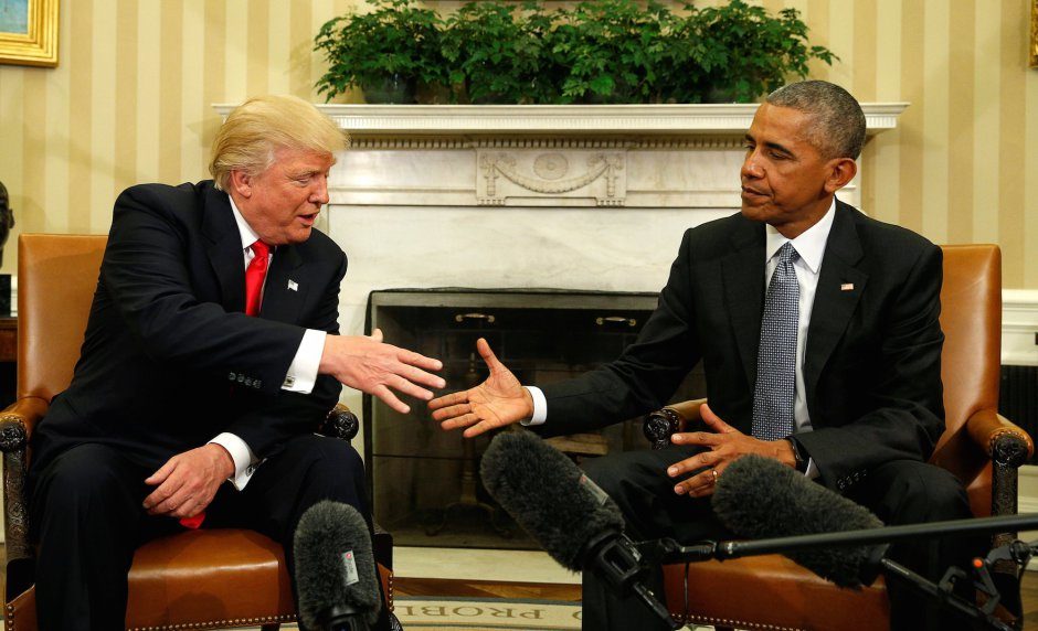 Obama and Trump shaking hands