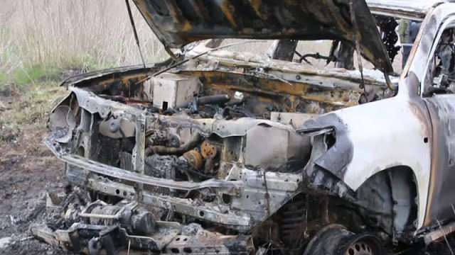 destroyed OSCE car