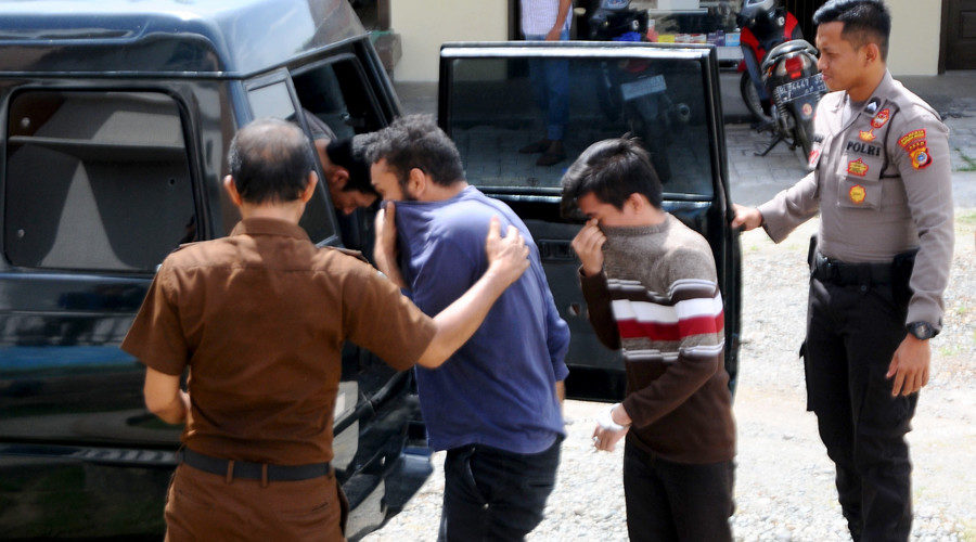 men taken Indonesian police