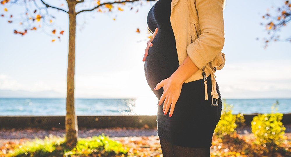 Click to enlarge pregnant woman
