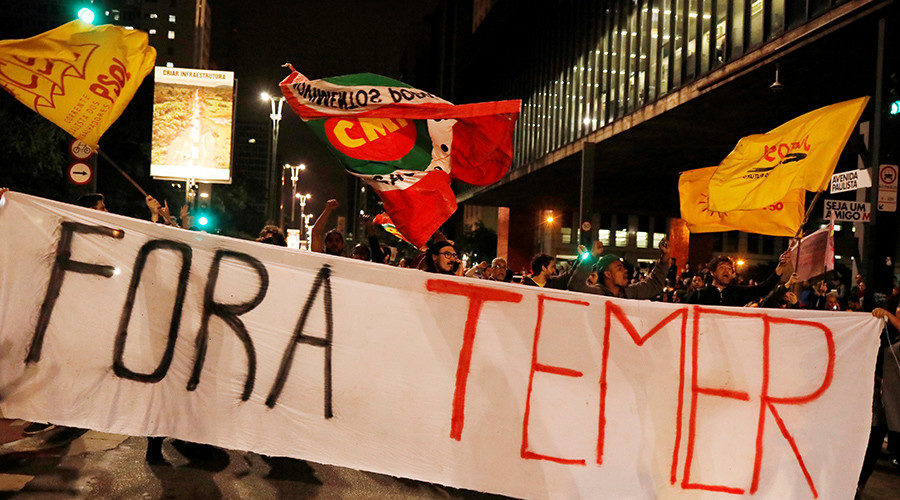 Demonstrators protest against Brazil's President Michel Temer