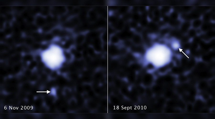 These two images, taken a year apart, reveal a moon orbiting the dwarf planet 2007 OR10