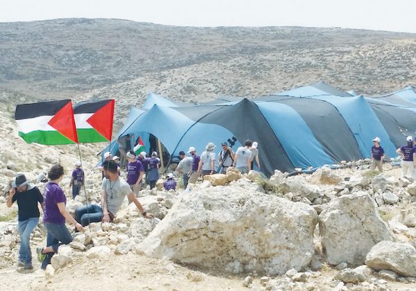 activists in Sarura rebuild their village
