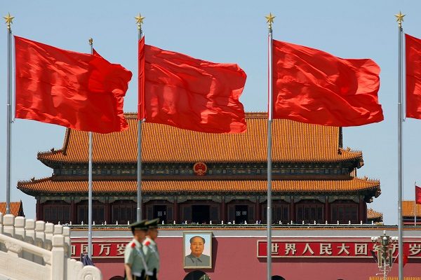 Chinese flags near building