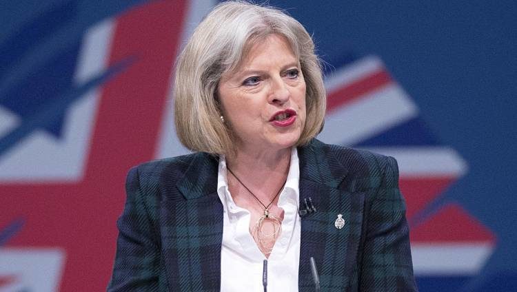 Click to enlarge Theresa May
