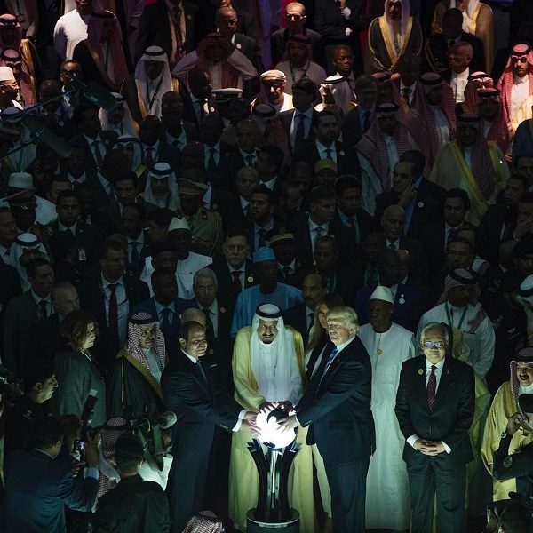 Trump touching orb