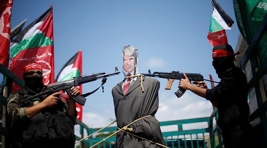 Palestinain protesters with Trump efigy