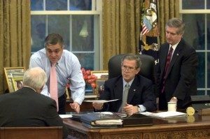 President George W. Bush and Vice President Dick Cheney receive an Oval Office briefing from CIA Director George Tenet