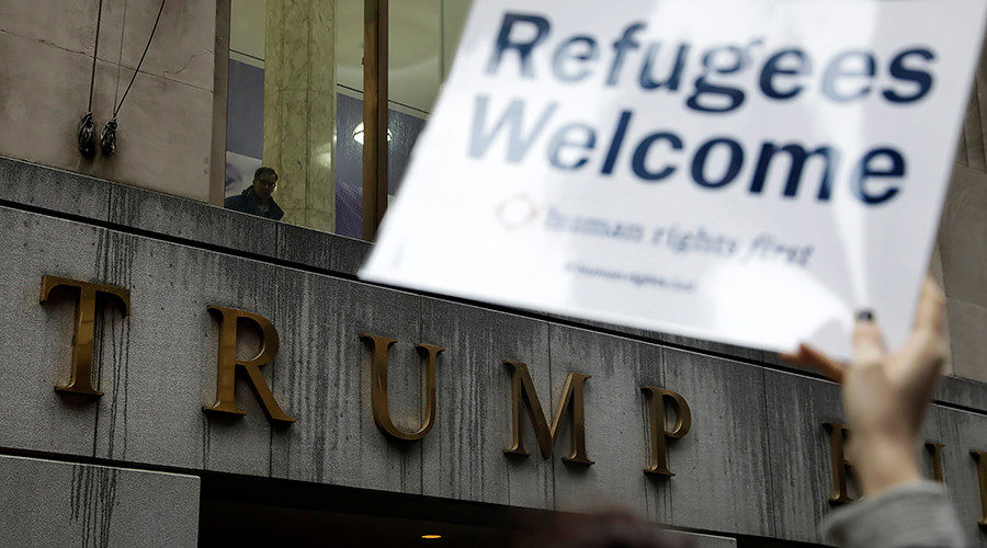 Click to enlarge Refugee protest Trump immigration migrant crisis