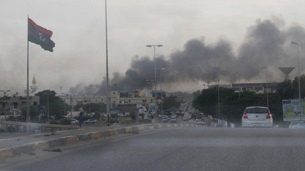 Click to enlarge Smoke rises during heavy clashes between rival factions in Tripoli, Libya, May 27, 2017