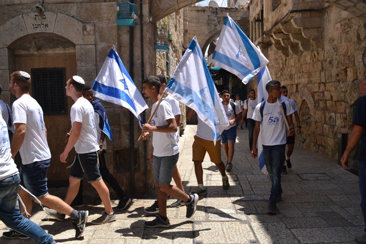 Ecstatic Zionists celebrating the 50th anniversary of Israel’s conquest of East Jerusalem