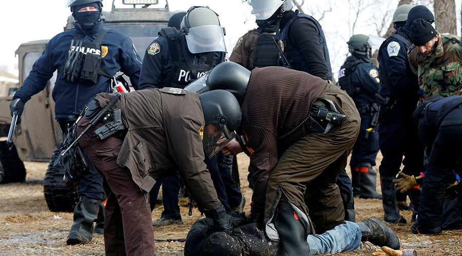 Click to enlarge Police detain protester Dakota Access Pipeline DAPL North Dakota