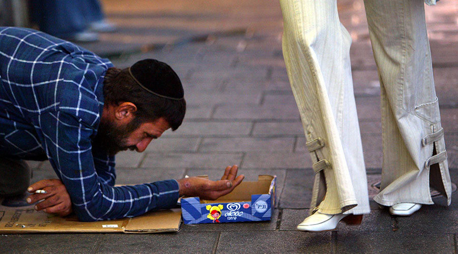Israeli man begs for charity in downtown Tel Aviv 
