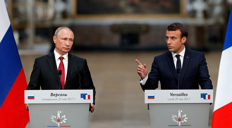 Click to enlarge Putin and Macron press conference