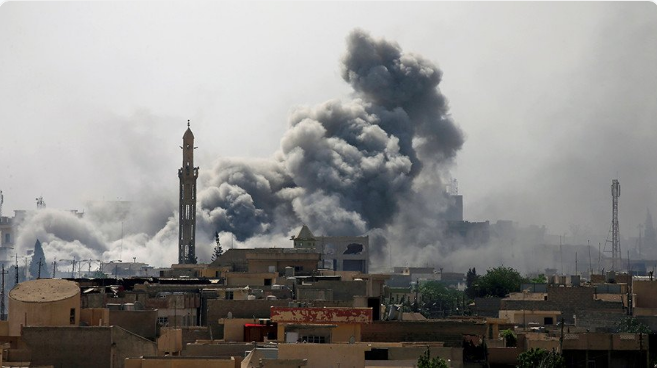 Smoke rises from an airstrike during a battle between Iraqi forces and Islamic State militants in western Mosul, Iraq, May 21, 2017