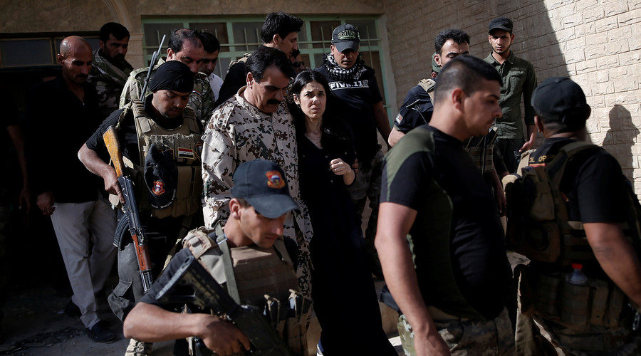 Click to enlarge Yazidi survivor and United Nations Goodwill Ambassador for the Dignity of Survivors of Human trafficking Nadia Murad (C), Kojo, Iraq