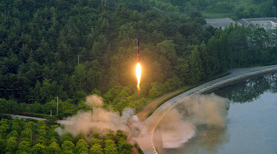 photo of a ballistic rocket test launch released by North Korea
