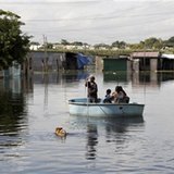 People use a make-shift boat