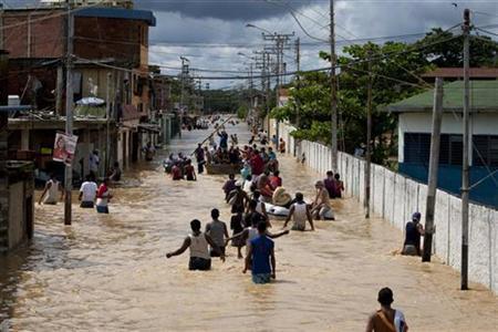 People evacuate after the flooding