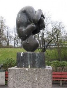 upside down baby statue