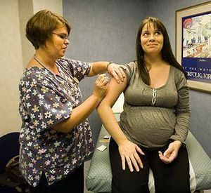 pregnant woman getting vaccine