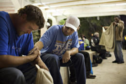 Click to enlarge homeless pray