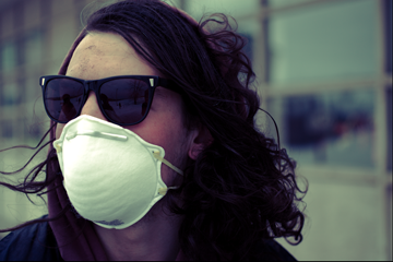 Click to enlarge woman with dust mask