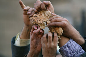 hands on bread