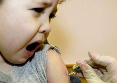 child getting vaccine