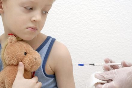 child being vaccinated