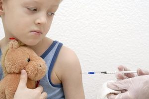 child being vaccinated