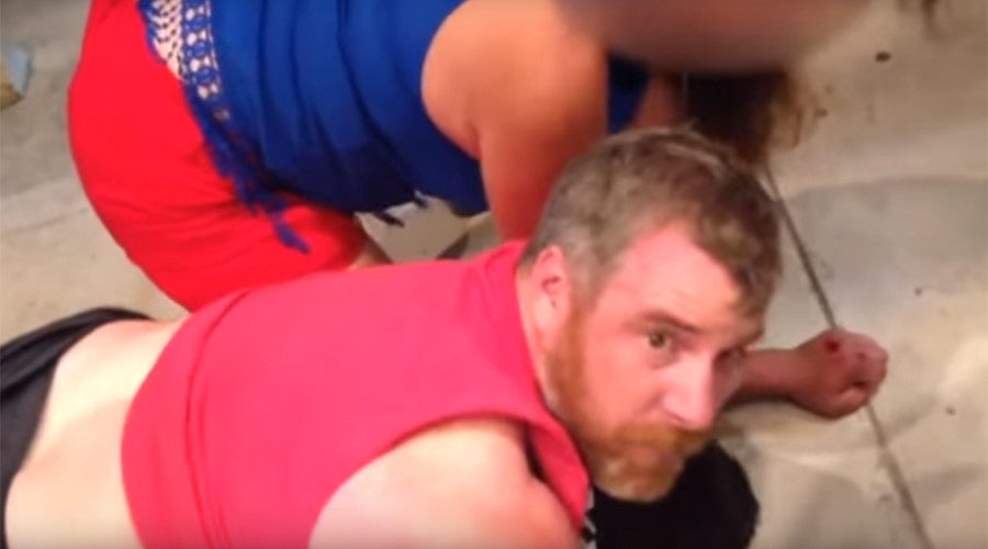 off-duty sheriff’s deputy applying a chokehold to a man