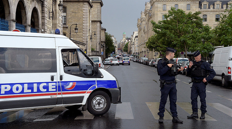 Click to enlarge French police officials gather at the entrance to Notre-Dame cathedral in Paris on June 6, 2017