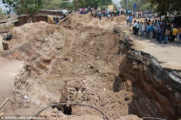 A 21-strong rescue team arrived at the scene and dug an underground passage to try and get to the father and son