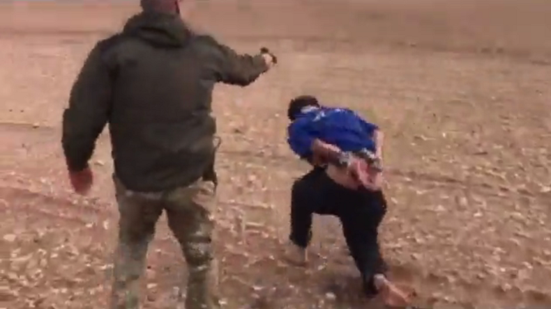 Iraqi soldier executing hospital worker