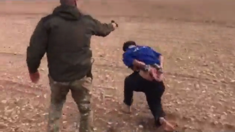 Click to enlarge Iraqi soldier executing hospital worker