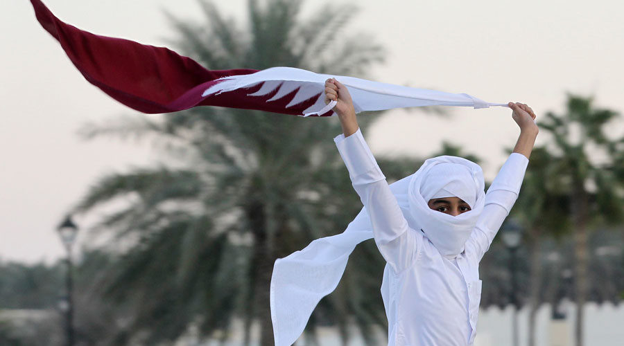 Girl with Qatar flag