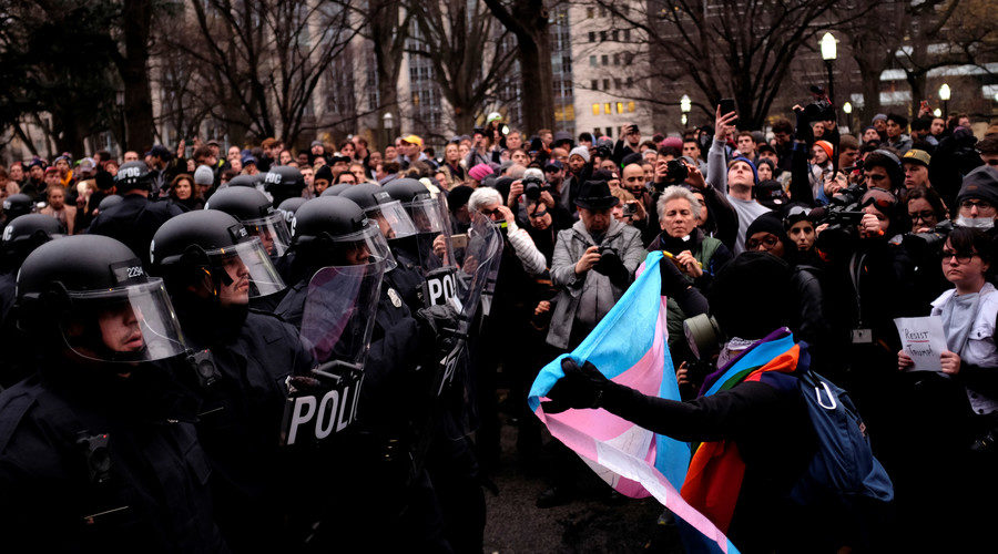 Protesters confront riot police