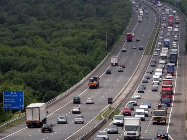 May Saudi Arabia handshake Billboard delays M4 traffic